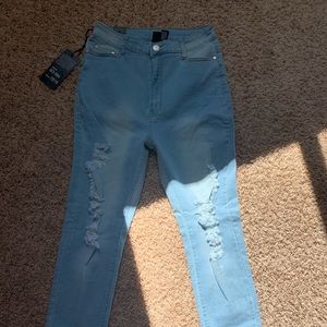 Light blue distressed jeans